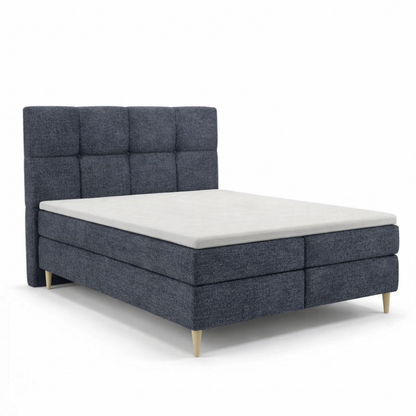Lit BOXSPRING LEO - Avec tête de lit, coffre intégré, matelas ressorts ensachés et surmatelas inclus