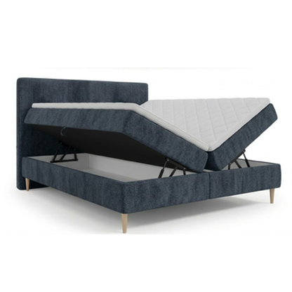 Lit BOXSPRING LEO - Avec tête de lit, coffre intégré, matelas ressorts ensachés et surmatelas inclus